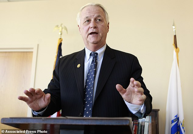 William Delahunt faces reporters during a news conference in 2010. Former Massachusetts congressman and district attorney Delahunt, a Democratic stalwart who postponed his own retirement from Washington to help pass former President Barack Obama's agenda, died at cause of a disease.