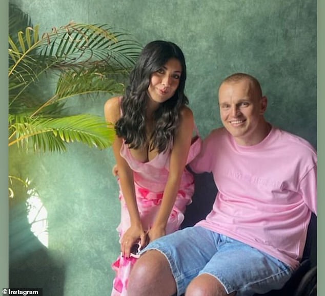 Former NRL star Alex McKinnon (pictured with new girlfriend Lily Malone) says he is happier now than he has been in ten years.
