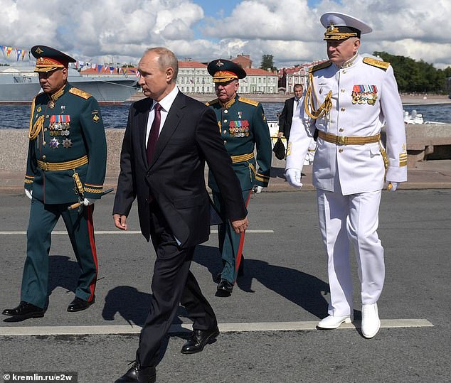 Admiral Nikolay Yevmenov (right, pictured with Vladimir Putin 2-L) has reportedly been sacked from his position as the commander-in-chief of the Russian Navy following a series of successful Ukrainian drone attacks on Moscow's warships