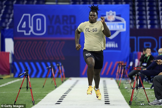 Amarius Mims impressed NFL scouts while running the 40-yard dash in Indianapolis on Sunday.