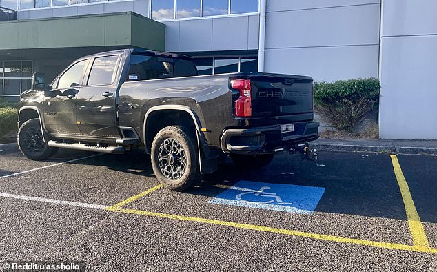 A photo shared on Reddit shows a giant Chevrolet SUV taking up three spaces, including a disabled spot, in a Melbourne parking lot on Saturday.