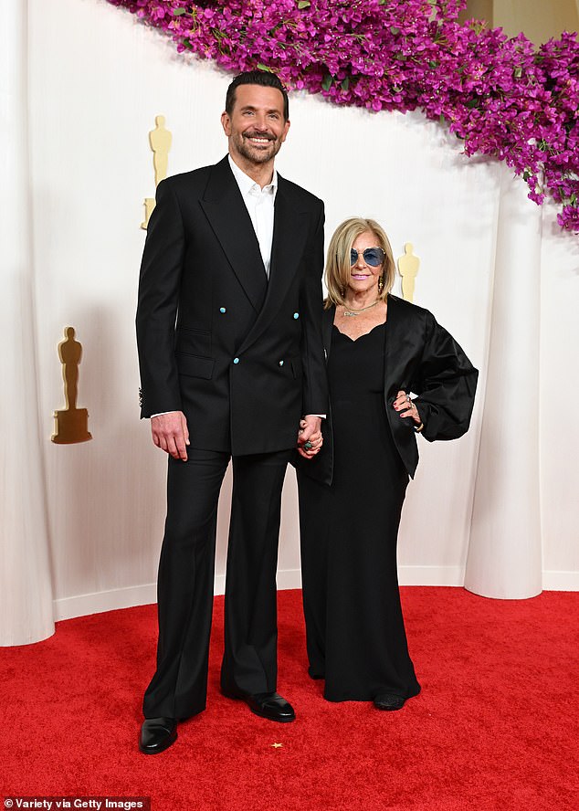 This comes after a source told Us Weekly that Gigi didn't walk the red carpet with boyfriend Bradley Cooper at the Vanity Fair Oscar party as she was scheduled to because she had to fly back to New York City at the last minute work. Seen with his mother at the Oscars