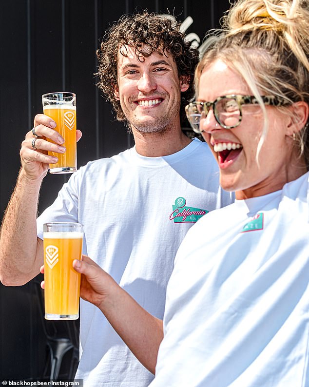 Another Australian brewery is in financial difficulty as a number of craft brewers went into voluntary administration, all blaming the same reason for their problems.  Pictured are a man and woman drinking Black Hops Brewing beers.