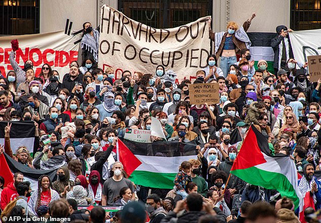 Harvard received 54,008 undergraduate applications, about 5 percent fewer than last year, following the backlash over anti-Semitism scandals.  Protesters are seen at Harvard on October 14, 2023.