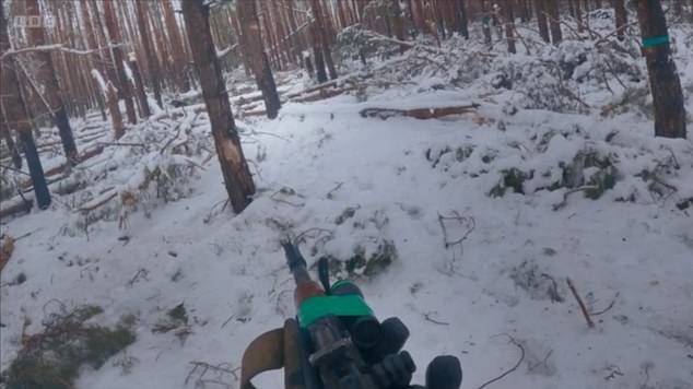 Disturbing footage captured by a Ukrainian soldier shows the tense moment he shot a Russian lurking in a forest in Kupyansk, Ukraine.