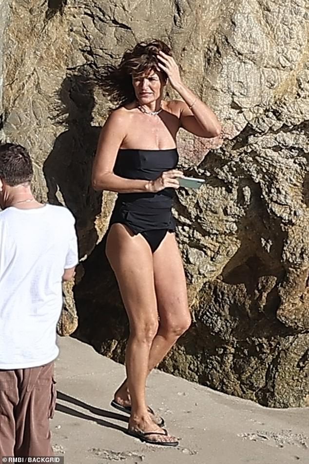 Helena Christensen impressed when she posed for a swimwear photoshoot in Malibu on Thursday