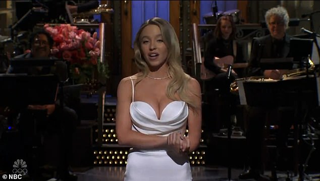 Sydney Sweeney hilariously shut down rumors of an 'affair' with her rom-com co-star Glen Powell in her SNL monologue by showing off her 'fiancé' in the crowd.