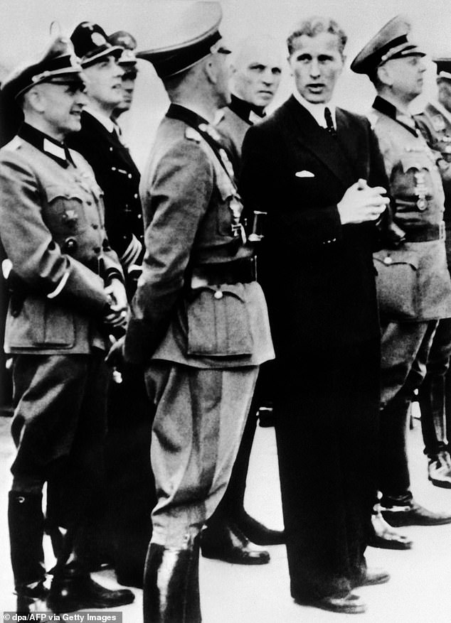 Wernher von Braun meets Nazi Wehrmacht officers during a demonstration for the launch of the V-2 rocket, scheduled for June 20, 1944. He became a key figure in the United States' victory in the space race