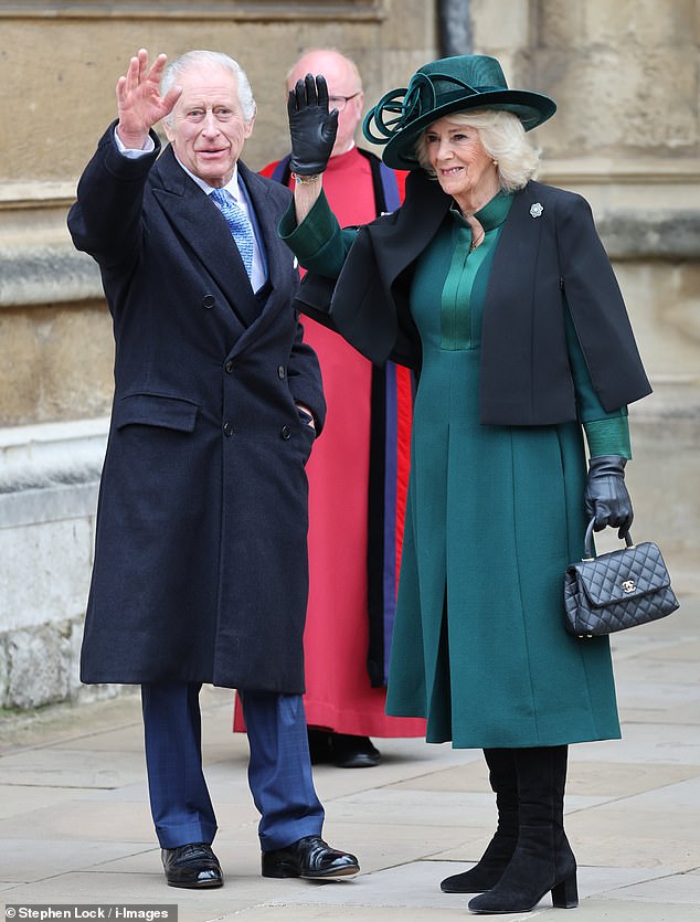 The King and Queen greet their arrival at St George's Chapel in Windsor earlier today;  They were seated away from members of the public, who are allowed to attend the service, inside the historic church