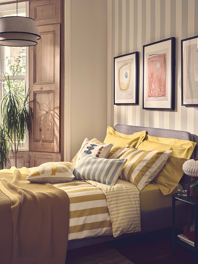 Colorful bedding could improve your mood.  Pictured: a yellow John Lewis board
