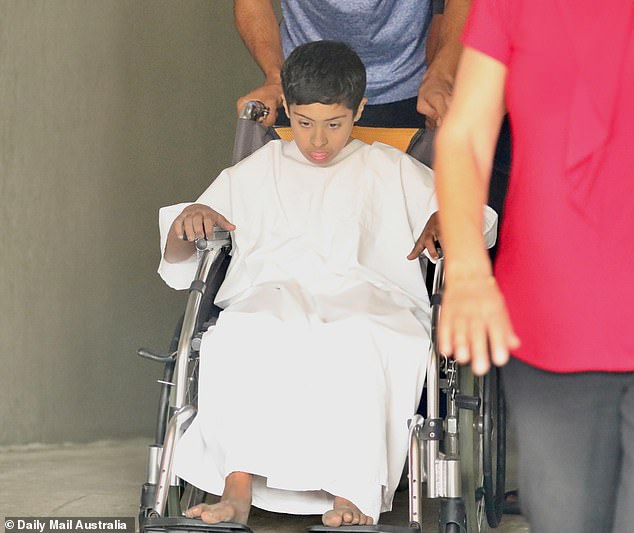 Hussein Al Mansoory is pictured in a hospital gown after being found just after midday on Monday