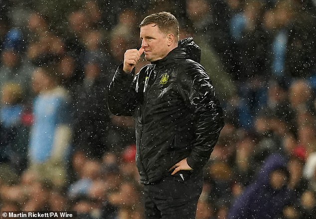 Eddie Howe watches in the rain as Manchester City dominate at the Etihad.