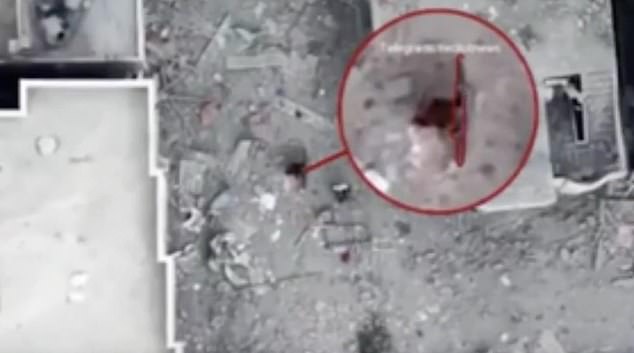 Footage released by Israel's military zooms in on one of the figures with a caption falsely claiming to show them with an RPG