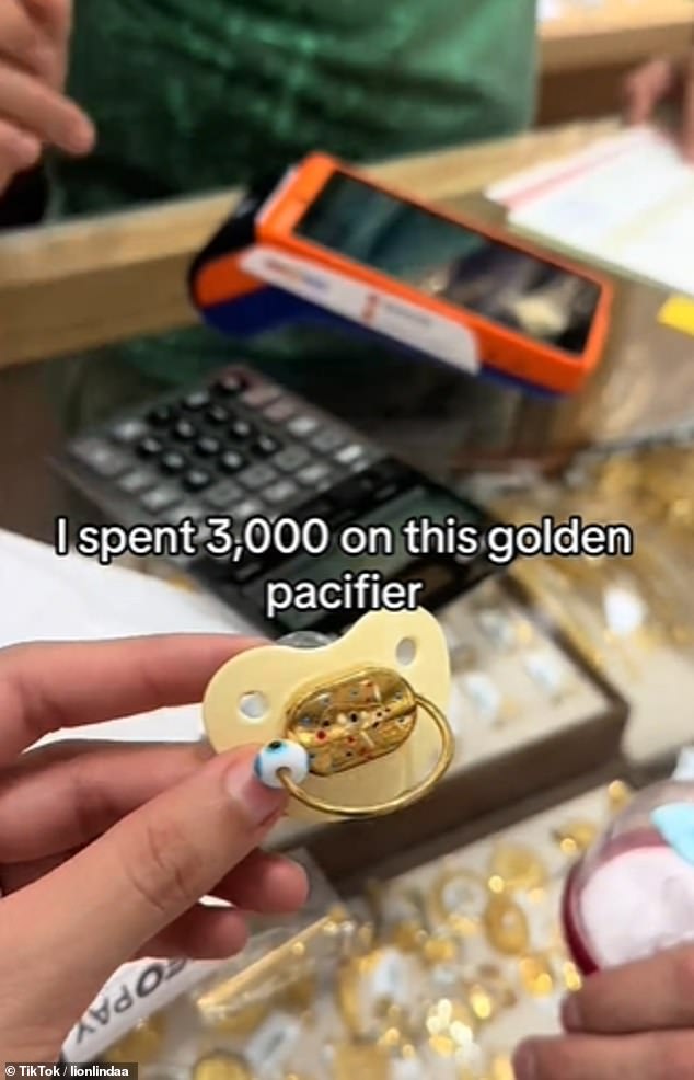The mother first showed her one million followers on TikTok a clip of how she bought a glittering gold pacifier that cost 3,000 dirhams, which equates to nearly £700.