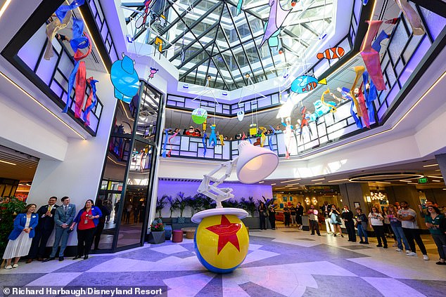 The Pixar Place Hotel is a colorful homage to the famous animation studio.  Pictured is the hotel lobby, where a sculpture of Pixar's lamp takes center stage.