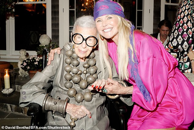Apfel's signature style—chunky bracelets, layered necklaces, and those iconic heavy-rimmed glasses—helped her become a fashion icon in her old age, or a 'geriatric star,' as she frequently referred to herself. ; seen with Christie Brinkley in 2022