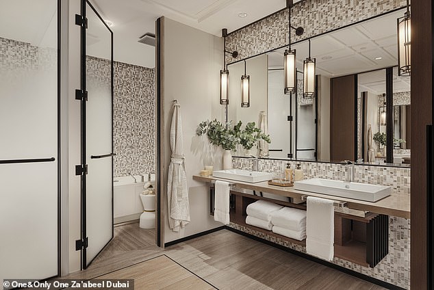 A bathroom with sinks for him and her in one of the hotel's rooms