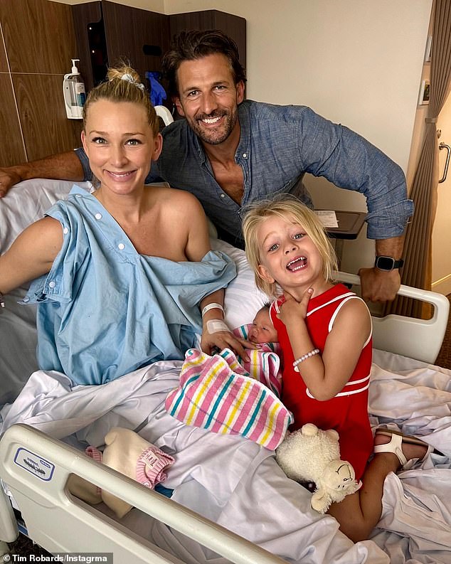The Bachelor's Tim Robards and Anna Heinrich welcomed their second child, a daughter named Ruby.  In an image shared by the couple, Anna is all smiles as she is seen sitting on her hospital bed surrounded by her husband Tim and her daughter Elle.  In the photo