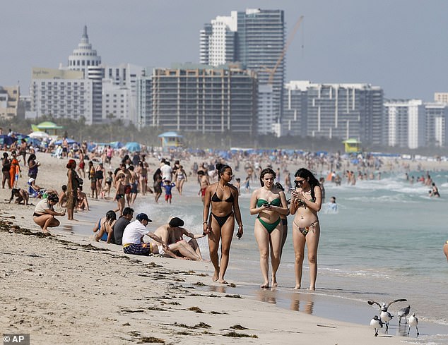 Spring Break is off to a tame start in Miami as beachgoers say there are 'more police than people' amid a crackdown on out-of-control parties