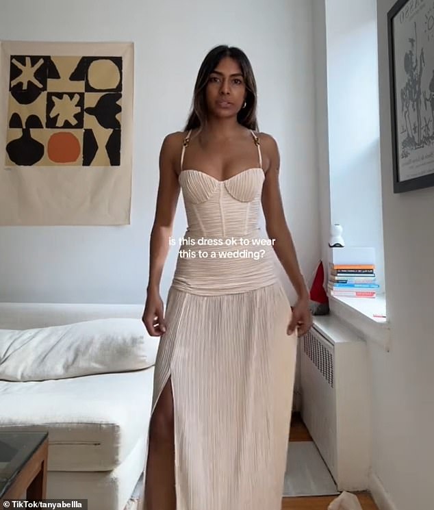 Tanya stunned in a floor-length cream beige dress that featured a side slit, but it was too close to white to wear to a wedding, according to many who criticized her for asking.
