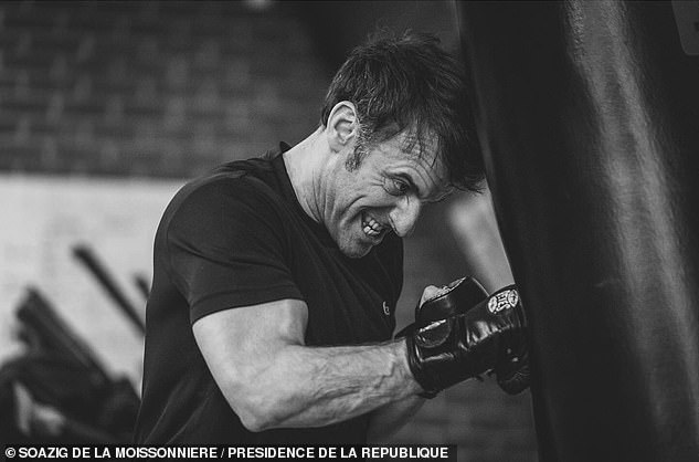 Soazing de la Moissonnière photographed the French president hitting a punching bag