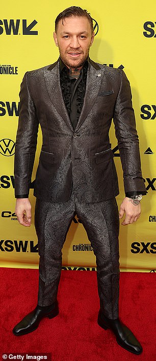McGregor, who will make his acting debut in Road House, looked stylish in a printed jacket and a pair of matching skinny pants.