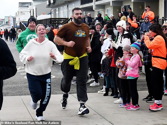 Jason Kelce crosses the finish line after participating in a charity 5K run/walk in New Jersey
