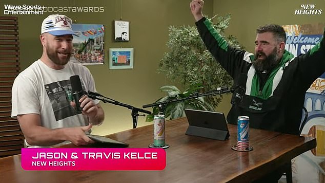 Travis (left) and Jason Kelce celebrate winning Podcast of the Year at the iHeart Radio Awards