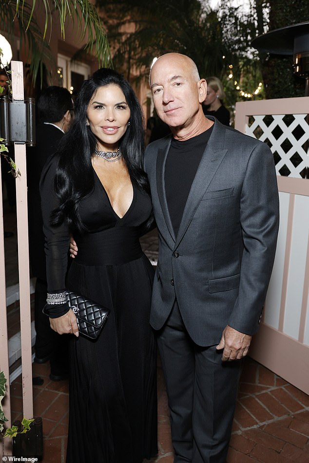 Jeff Bezos cozyed up to fiancee Lauren Sanchez at Chanel's star-studded pre-Oscar awards dinner in Los Angeles on Saturday
