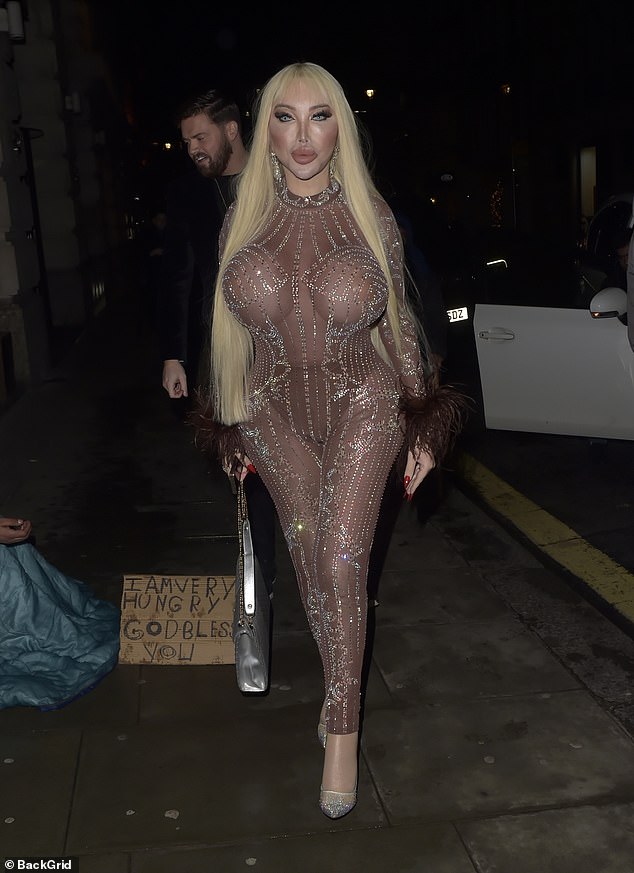 Jessica Alves, 40, put her breasts center stage, stunning in a sheer rhinestone bodysuit for a night out at Novikov Restaurant & Bar in Mayfair on Monday.