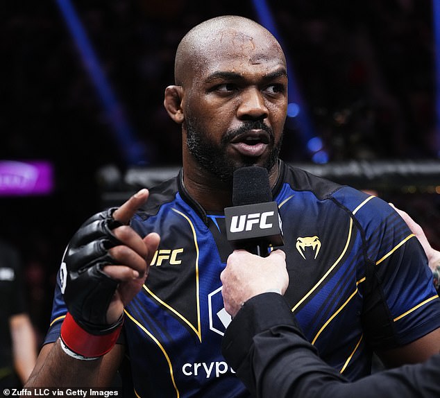 Jon Jones moved Tom Aspinall's hand off his shoulder and rejected a confrontational photo.