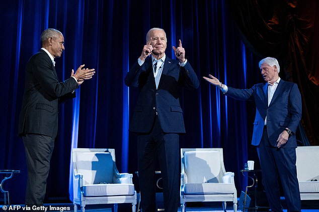 Like an animatronic Disney character, the stiff Old Joe waved, smiled and turned to greet former Presidents Bill Clinton and Barack Obama standing at his side.  (Above) Biden campaign fundraising event at Radio City Music Hall in New York City on March 28, 2024