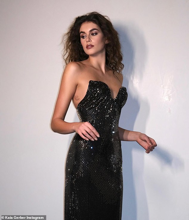 Kaia Gerber dazzles in strapless black sequin Celine gown with