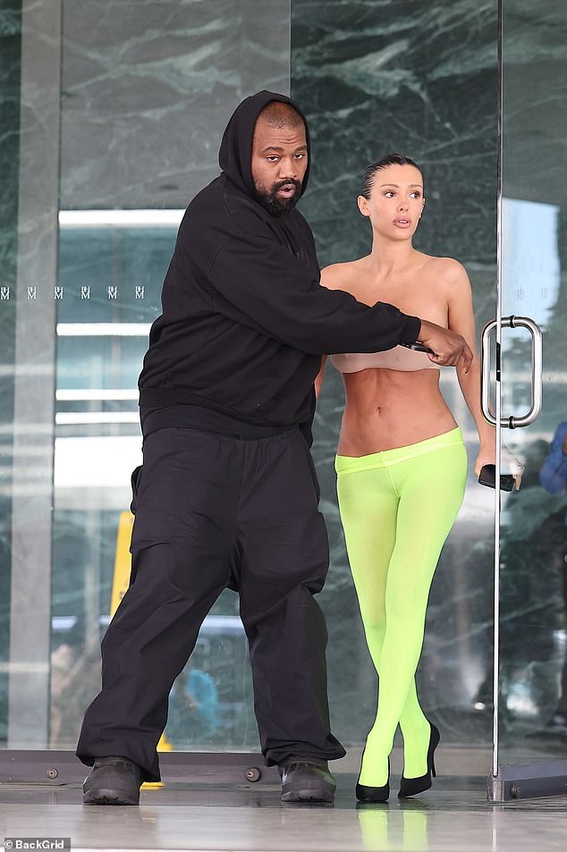 Kanye West, 46, and his wife Bianca Censori, 29, turned heads in Los Angeles once again with their latest scandalous display - but a body language expert has revealed the outing could have revealed a different dynamic between both.