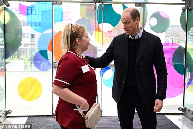 A prince's compassion: The Princess of Wales said in her video, filmed in Windsor on Wednesday, that having 'William by my side is also a great source of comfort and reassurance' (The Prince pictured with a nurse in Sheffield on Tuesday)