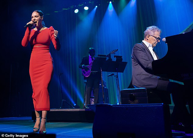 The artist's departure took place during her ongoing tour, titled An Intimate Evening with Katharine McPhee and David Foster;  seen with Foster in 2022