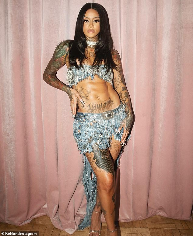 Kehlani bared her washboard abs in a stunning bejeweled denim ensemble for some behind-the-scenes photos she shared on Monday.