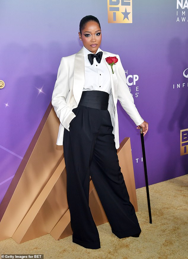 Keke Palmer looked incredible at the 55th NAACP Image Awards in Los Angeles on Saturday.  The 30-year-old actress looked stylish in a black and white tuxedo-inspired ensemble complete with a cane as an accessory at the annual awards show