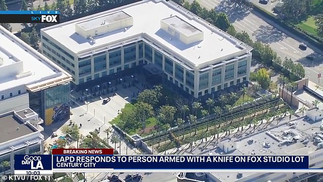 Los Angeles police officials confirmed to DailyMail.com that the woman was brandishing a knife inside the Fox Studio parking lot on Wednesday morning.