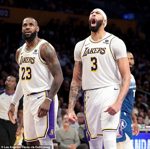 Anthony Davis (right) grabbed 21 rebounds in the second half to lead the Lakers past the T-Wolves.