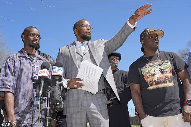 Michael Corey Jenkins (left) and Eddie Terrell Parker (right) stand alongside lead attorney Malik Shabazz as they ask a federal judge Monday (March 18) to impose the harshest possible penalties on the officers .