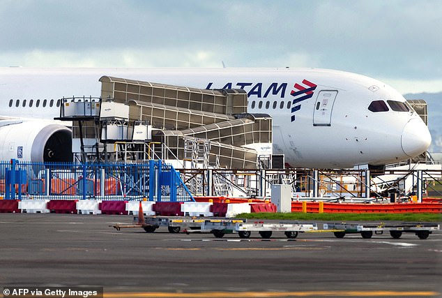 Latam Airlines Boeing 787 Dreamliner aircraft, which suddenly lost altitude mid-flight a day earlier, is seen on the tarmac of Auckland International Airport in Auckland on March 12, 2024