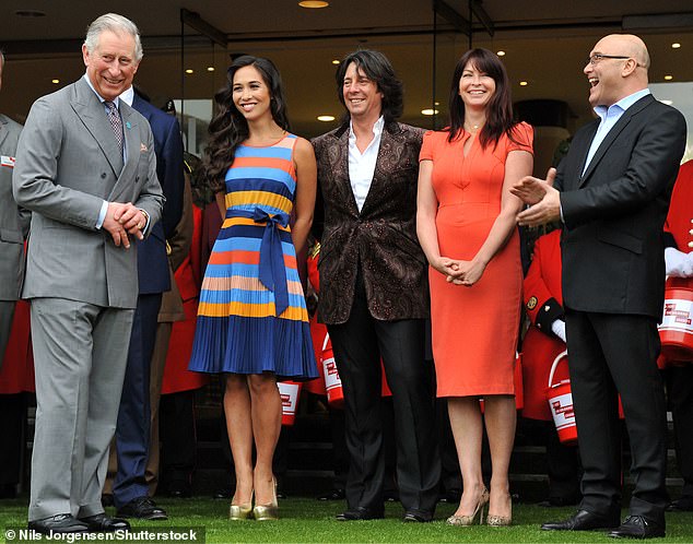 Laurence Llewelyn-Bowen, (centre) has said he has been getting the 'cold shoulder' from his friend King Charles since the coronation last May - pictured together in 2012