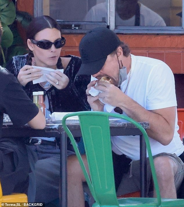 Leonardo DiCaprio's girlfriend, Vittoria Ceretti, showed off a silver ring on her ring finger Tuesday during lunch at Yuca's restaurant in Los Angeles.