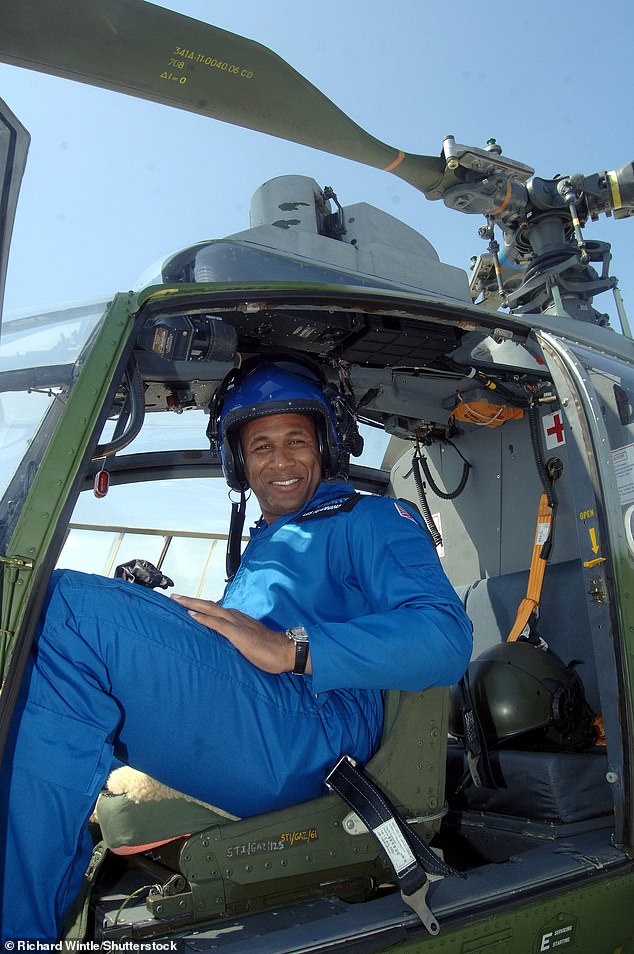 Les Ferdinand, pictured in 2006, has revealed how he became a licensed helicopter pilot.