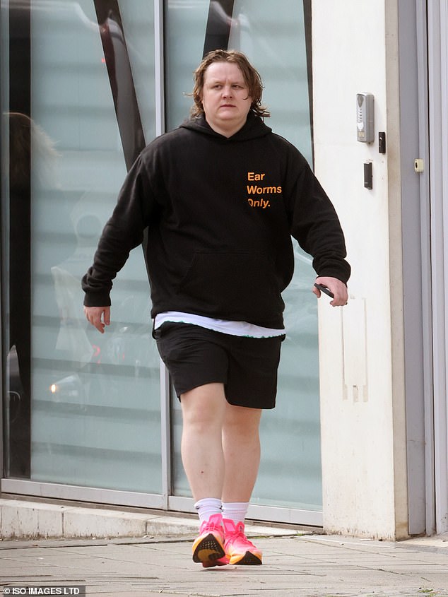 Lewis Capaldi looked healthy and happy as he shopped at Tesco alongside a friend in London on Wednesday.