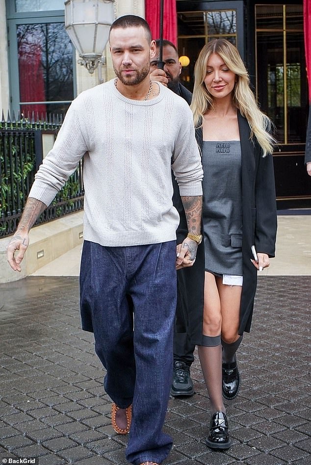 Liam Payne put on a PDA with his girlfriend Katie Cassidy as they headed out for lunch in Paris on Saturday.