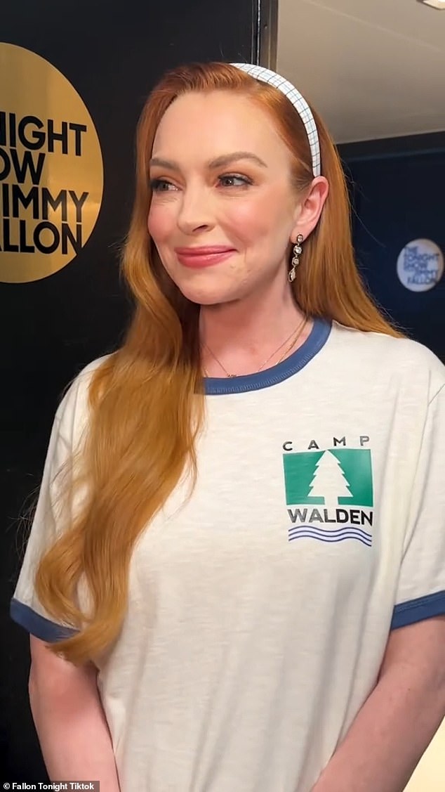 Lindsay Lohan donned a Camp Walden T-shirt and a preppy headband to recreate a summer camp scene from her 1998 Disney film, The Parent Trap, on Monday.