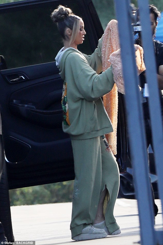 Scheana Shay also stayed comfortable in a pale green hoodie paired with matching and slightly oversized sweatpants