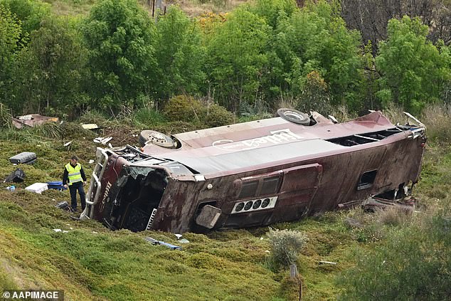 The school bus rolled down an embankment on the Western Highway near Pentland Hills, west of Melbourne, and the bus driver, 31 students and teachers suffered injuries (pictured).
